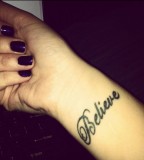 Believe Tattoos on Woman's Wrist 