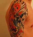 Brilliant Colors Of Koi Fish Tattoo