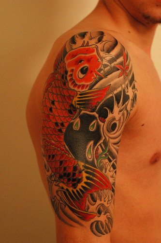 Brilliant Colors Of Koi Fish Tattoo