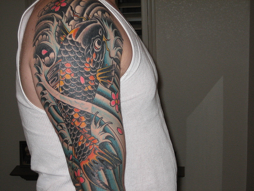 Splendid Koi Fish Sleeve Tattoo Designs