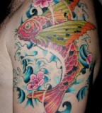 Beautiful Koi Fish Tattoo Designs for Men - Upper Arm