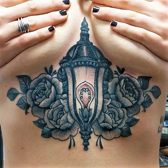 lantern-sternum-tattoo