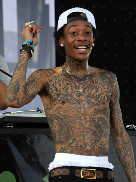 Wiz Khalifa Lettering Tattoo For Men