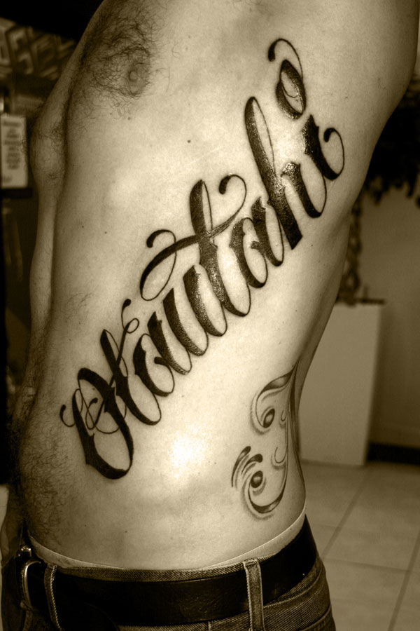 Large Lettering Tattoo For Men