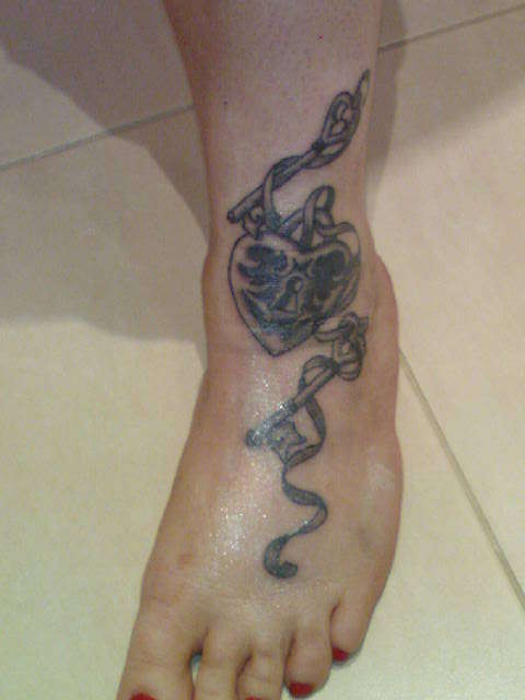 Lock And Key Instep Tattoo