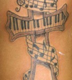 Music Notes Tattoos On Rib