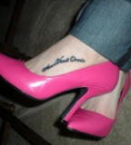 Sexy Latin Love Conquers All Tattoo On Foot