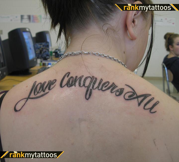 Upper Back Love Conquers Tattoo