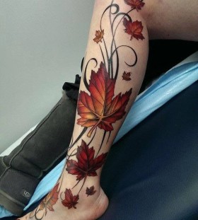 maple-leaves-on-leg-autumn-tattoo maple-leaves-on-leg-autumn-tattoo