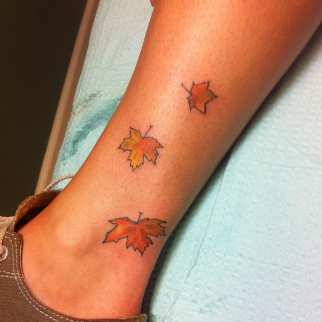 maple-leaves-on-leg-tattoo