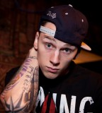 Machine Gun Kelly Tattoo in Right Hand