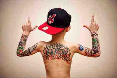 Child Imitating Machine Gun Kelly Tattoo Picture