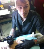 MGK Create a New Tattoo Photos