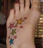 Colorful Tattoos Of Small Stars On Foot