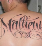 Tribal Name Tattoo For Man