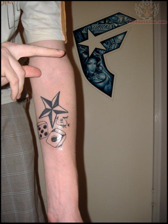 Awesome Tribal Nautical Star Tattoo Design On Arm