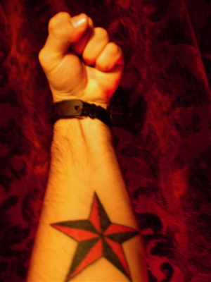 Black and Red Nautical Star Forearm Tattoo Design Pic