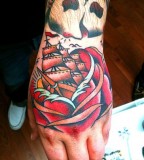 Flower Ship and Old School Skull Tattoo on Hand