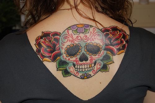 Ethnic Style Old School Skull Tattoo Design On Upper Back