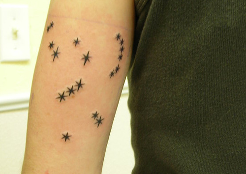 Dashing Orion Tattoo Design on Forearm