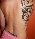 Swirls Rib and Lower-back Tattoo Designs for Women (NSFW)