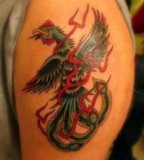 Red Green Phoenix Arm Tattoo