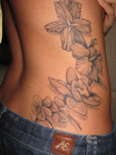 The Hawaiian Flowers Like Hibiscus Orchid And Plumeria Tattoos