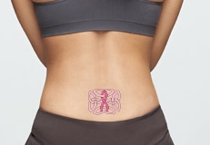 Purple Ribbon Tattoo On Hip For Girl