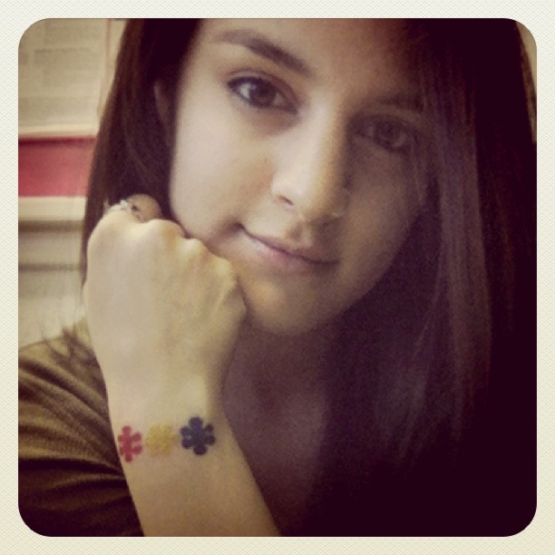 Three Little Different Color Puzzle Pieces Outer Wrist Tattoo Idea for Girls