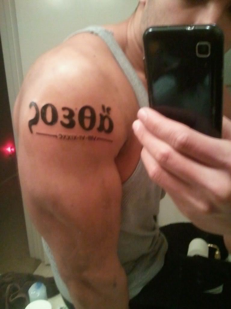 Numeric Upper Arm Body Tattoo