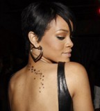 Rihanna's Ink Dictionary Tattoo On Her Back