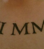 Chest Roman Letter Tattoo Designs