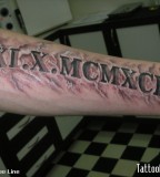 Forearm Roman Letter Tattoo Designs