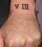 Lucky Number 8 In Roman Numerals Tattoo