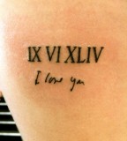 Roman Numeric And Lettering Tattoo Ideas