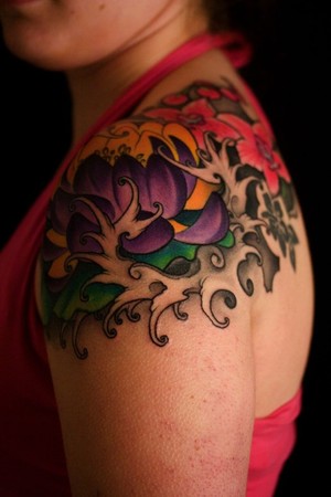 Red and Back Floral Shoulder Tattoo