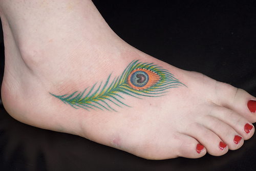Sexy Foot With Simple Feather Peacock Tattoo