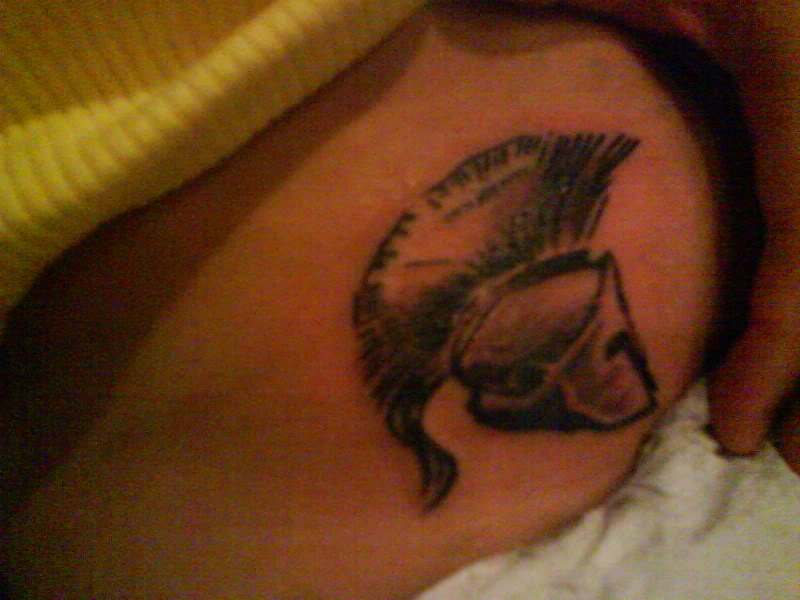 Ribs Spartan Helmet Tattoo