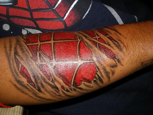 Unbelievable Ripped Skin Spiderman Tattoos