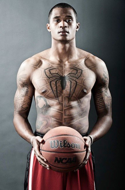 Darren Moores Spiderman Logo On Chest Tattoo