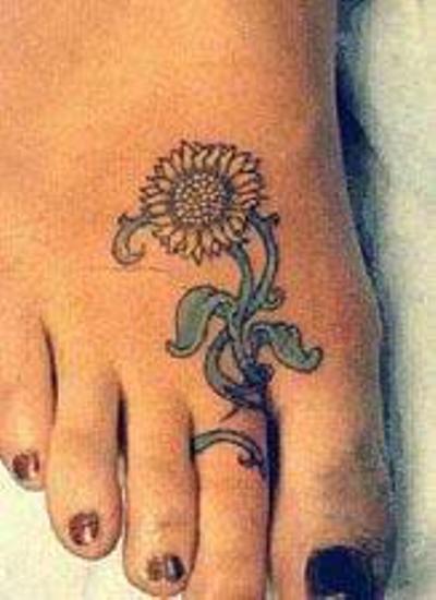 Cute Tiny Sunflower Tattoo Design on Foot