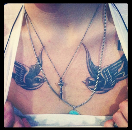 Imaginary Swallow Bird Tattoo On The Chest For Girls