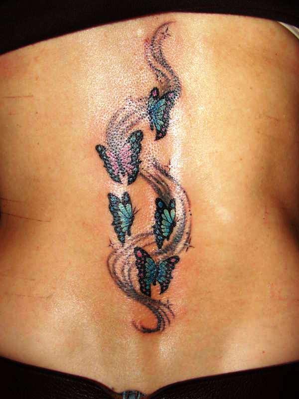 Tremendously Cool Colorful Swirl Butterflies Tattoo For Girls