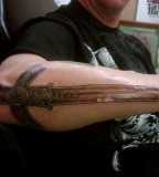 Tribal Dragon Sword Tattoo Design Inspiration