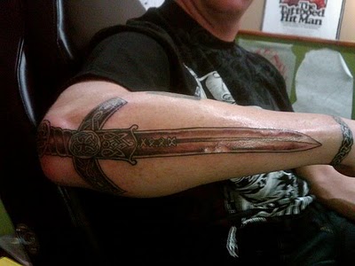 Tribal Dragon Sword Tattoo Design Inspiration