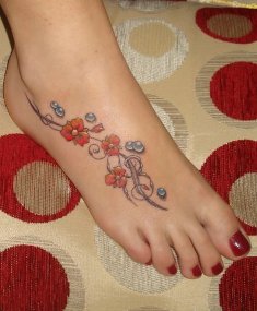 Swirly Red Flowers Feet Tattoo Design for Women