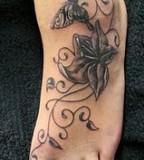 Foot / Feet Tattoo Ideas With Flower & Butterflies Tattoo Designs for Women