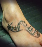 Foot Tattoos Of Music Notes