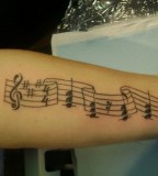 Music Notes Arm Tattoo Photo