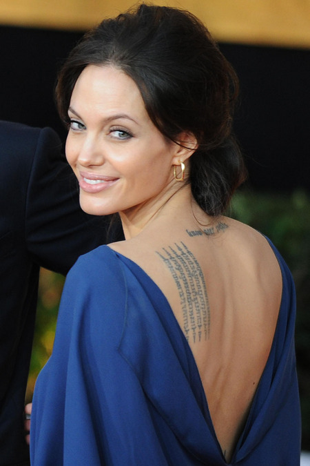 Angelina Jolie Service Translation tattoo